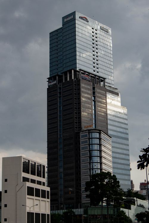 Free Sleek skyscraper against overcast sky in Ho Chi Minh City, Vietnam. Stock Photo