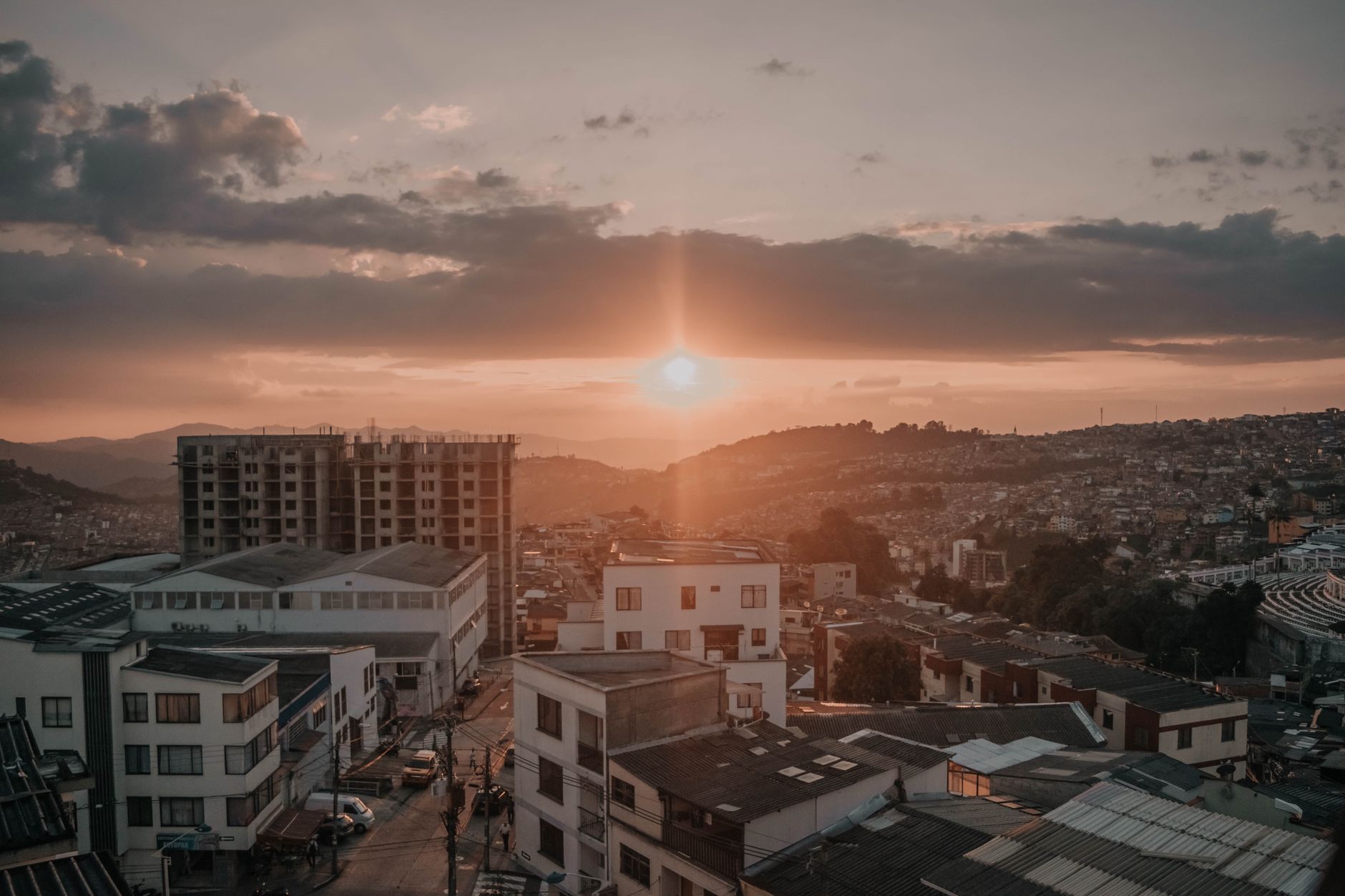 A breathtaking sunset view over the urban landscape of Manizales, Colombia.
