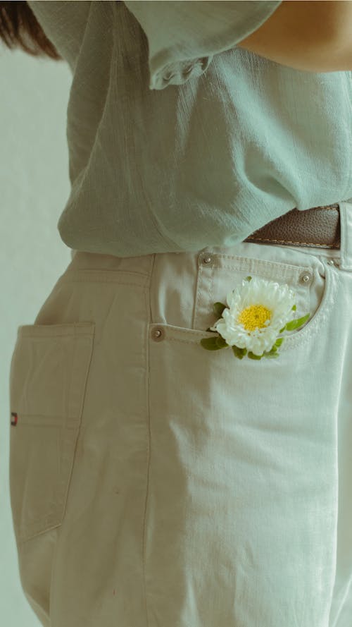 Close-up of Flower in Woman Pants Pocket