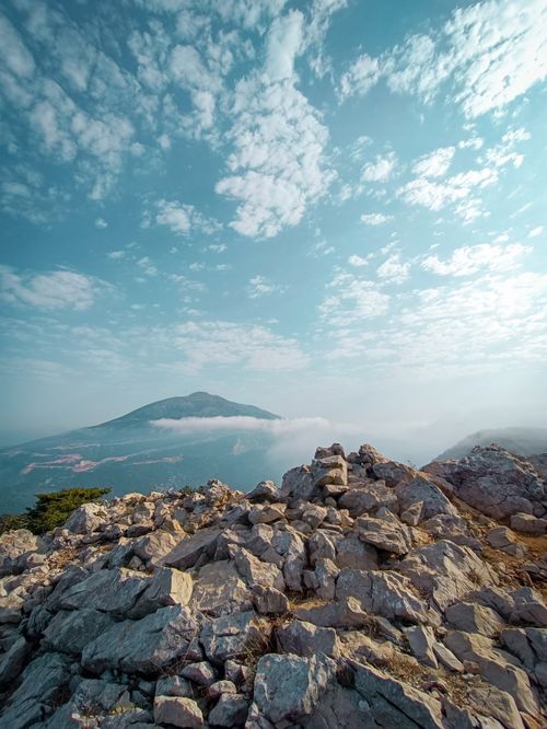 Free Stunning view of rocky mountains in Latakia, Syria under a vibrant blue sky. Stock Photo