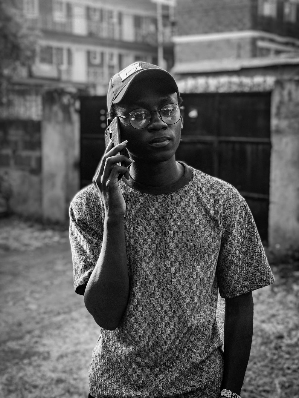 African man speaking on a phone