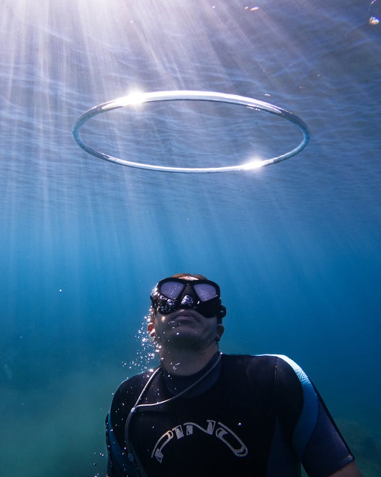 Man In Diving Suit Underwater