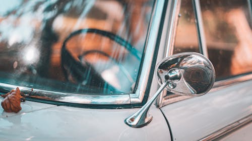 Silver Car Side Mirror in Close Up Shot