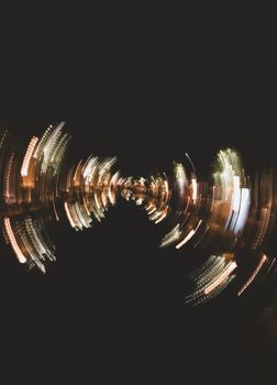 Artistic light trails creating an abstract pattern at night in Alkmaar, Netherlands.