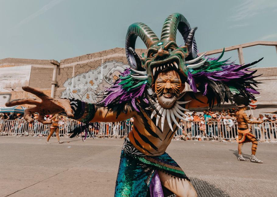Colorful carnival dancers performing in vibrant street parade celebration outside Rio
