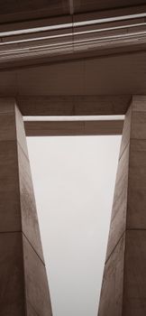 Low angle view of modern architectural structure in The Hague, showcasing an abstract gap.