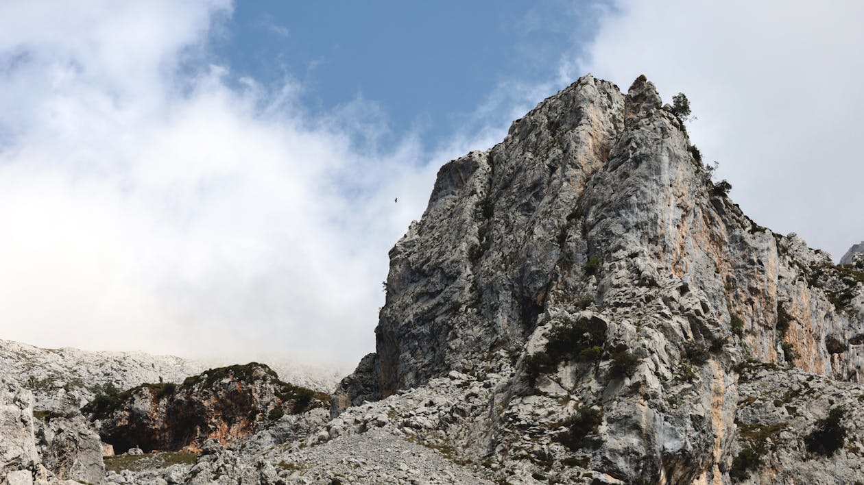 Gray Rocky Mountain Under the Blue Sky