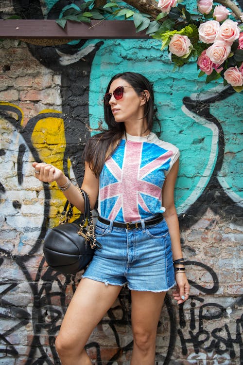 A Woman in White and Blue Sleeveless Shirt