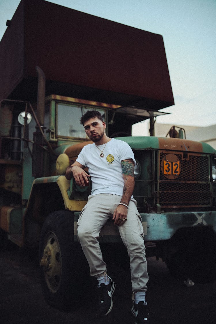 Man Posing By Truck