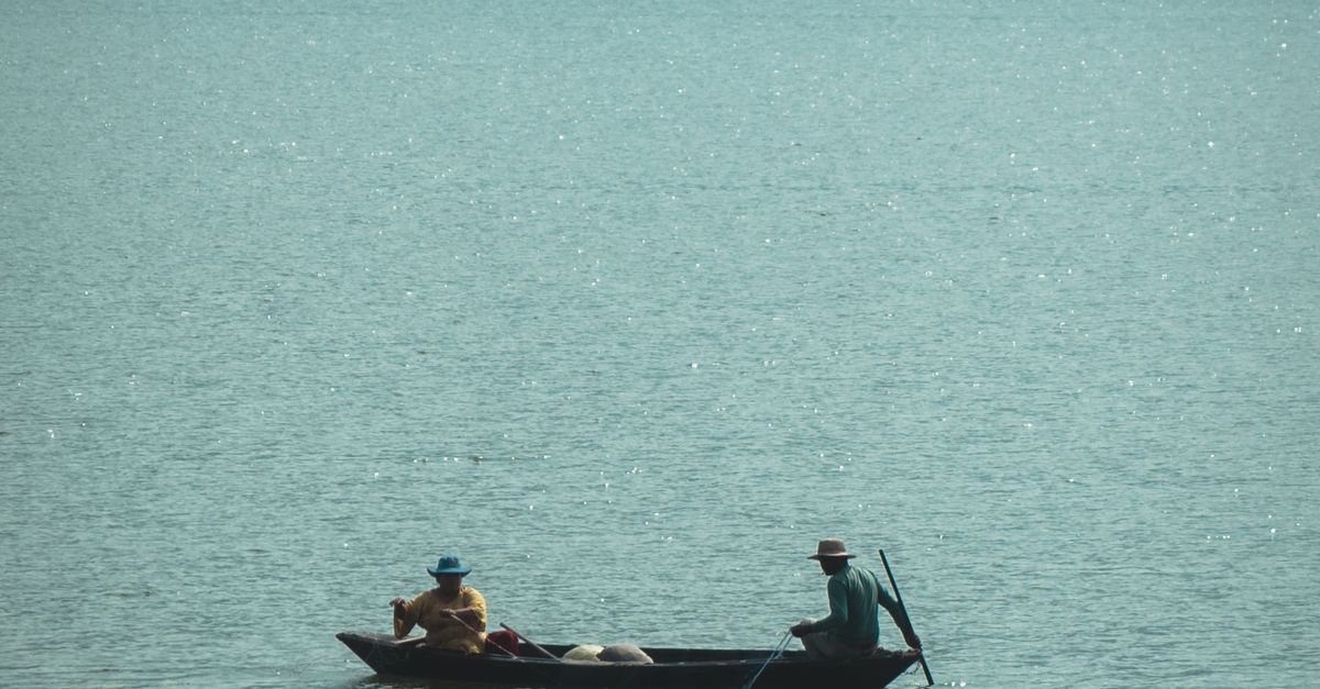 People Riding on Boat on Sea · Free Stock Photo