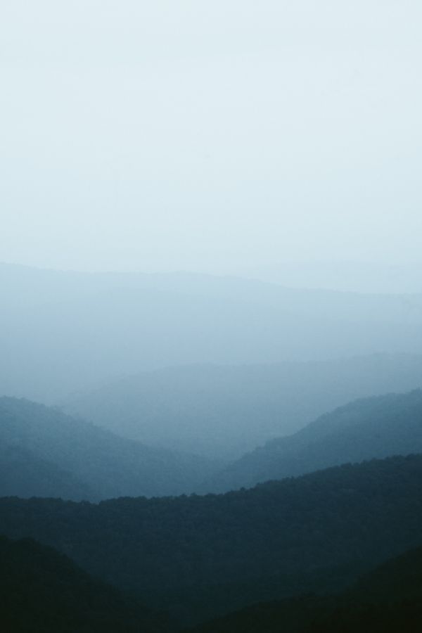 Layered blue hills at dusk, Nandu Vasudevan on Pexels