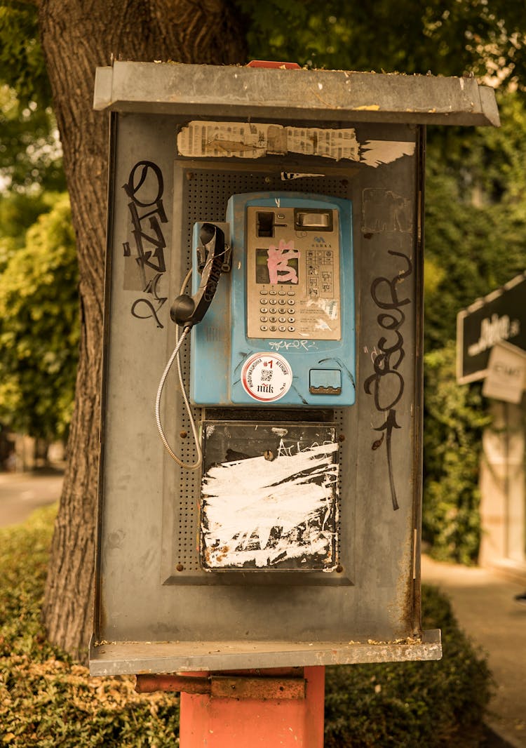 An Old And Used Payphone