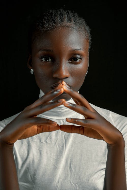 Portrait of a Woman in White Turtleneck Top 