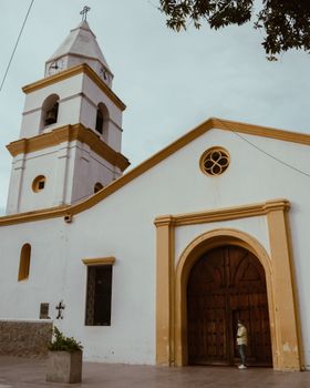 Low angle view of Iglesia Inmaculada Concepción's facade in Valledupar, Colombia.