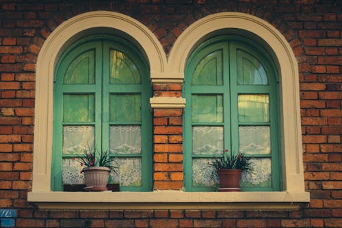 Arched Windows on Brick Wall