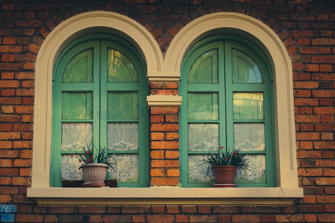 Arched Windows on Brick Wall