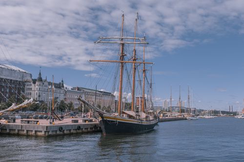 Free A majestic sailing ship docked at a marina in Helsinki, Finland on a bright summer day. Stock Photo