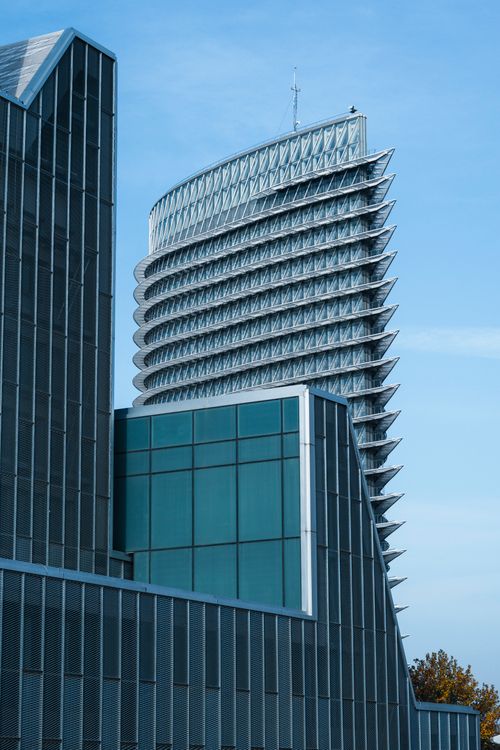 Blue Glass Walled High Rise Building · Free Stock Photo