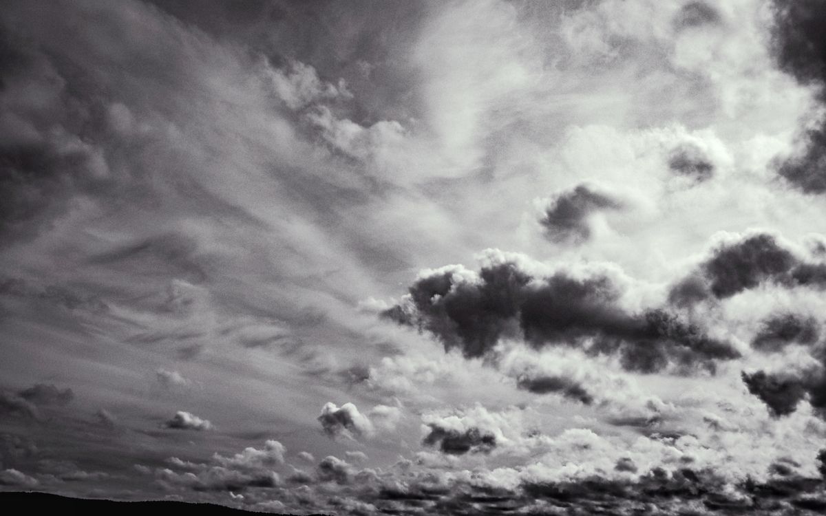 Black and White Photo of a Cloudy Sky · Free Stock Photo