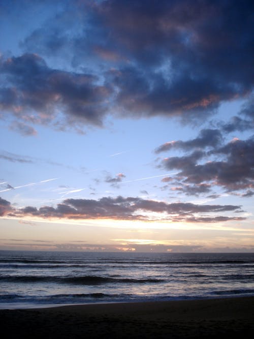 Gratis arkivbilde med hav, himmelen, kveldssol