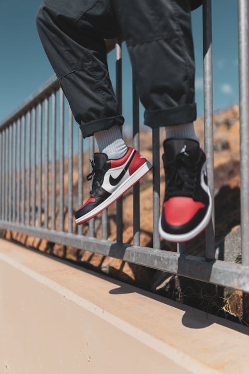 Man Jumping On Puddle Of Water · Free Stock Photo