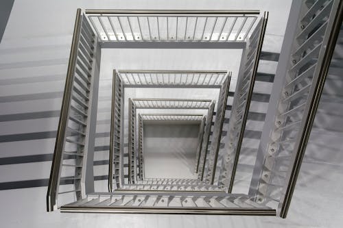 High Angle View of a Staircase with Metal Railing 