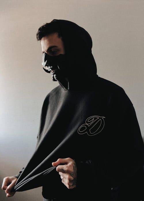 Free Man in Black Hoodie Jacket Wearing Black Mask Stock Photo