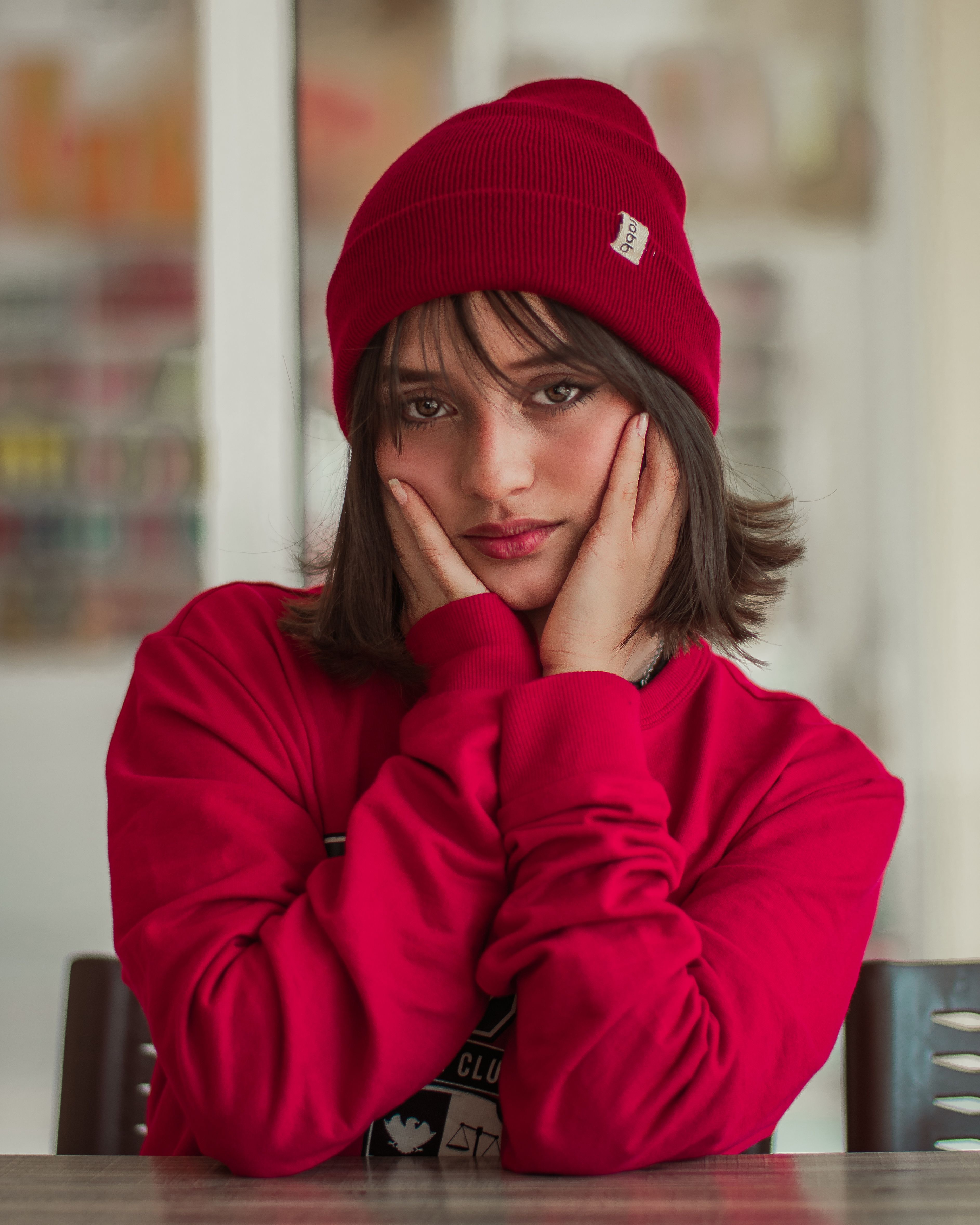 A Woman wearing Red Sweater and Red Beanie · Free Stock Photo