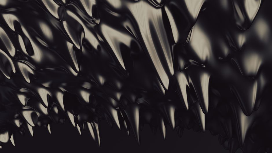 An abstract art image featuring dark, oblique, spiky shapes with a glossy texture.