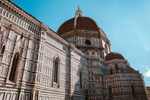 Capture of Florence Cathedral showcasing the intricate architectural details under a clear sky.