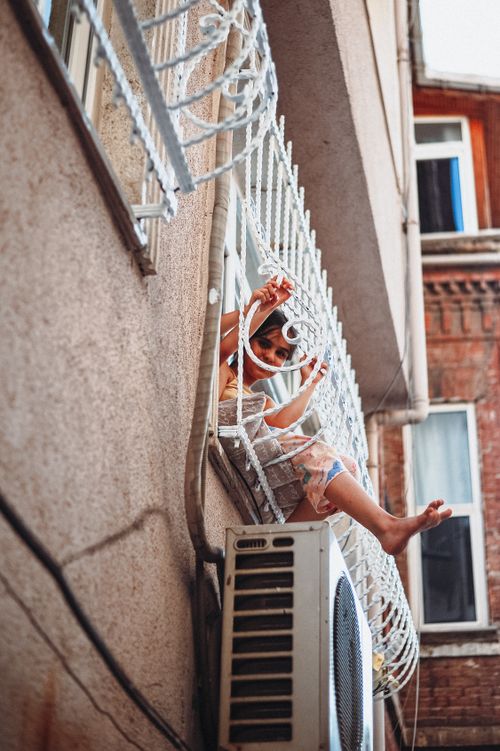 Toshiba Outdoor Air Conditioner Unit on Yellow Wall · Free Stock Photo