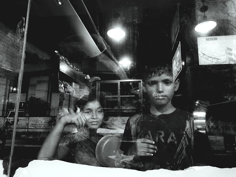 Children Through Shop Window