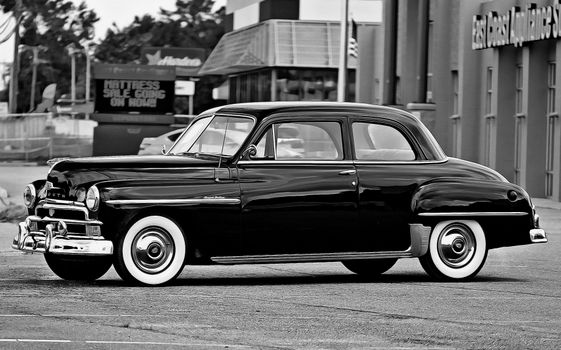 Grayscale Photo of a Classic Black Car