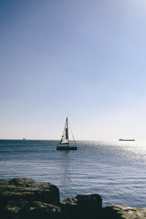 A Sailboat on the Sea Bay
