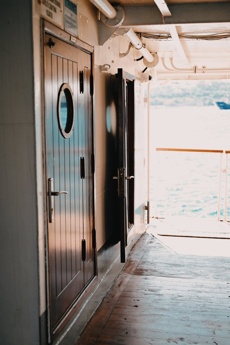 Doors In Hallway On Ship In Sea