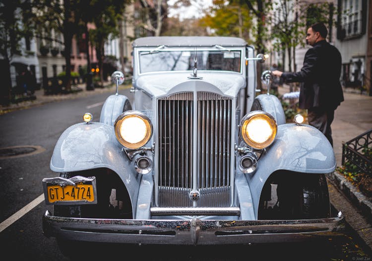 Gray Classic Car Parked On Roadside