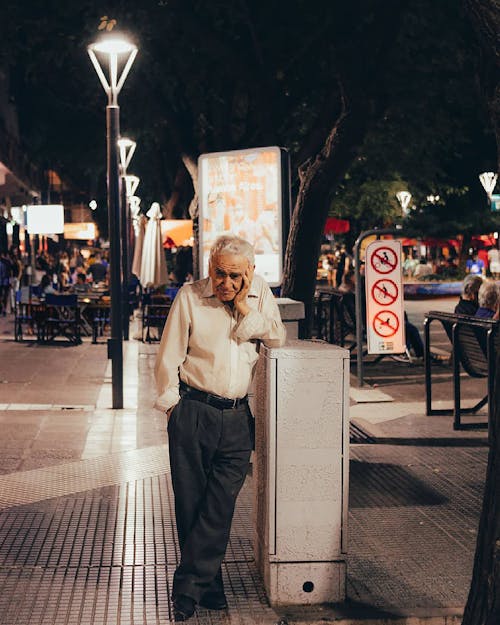 Elderly Man Standing on the Street