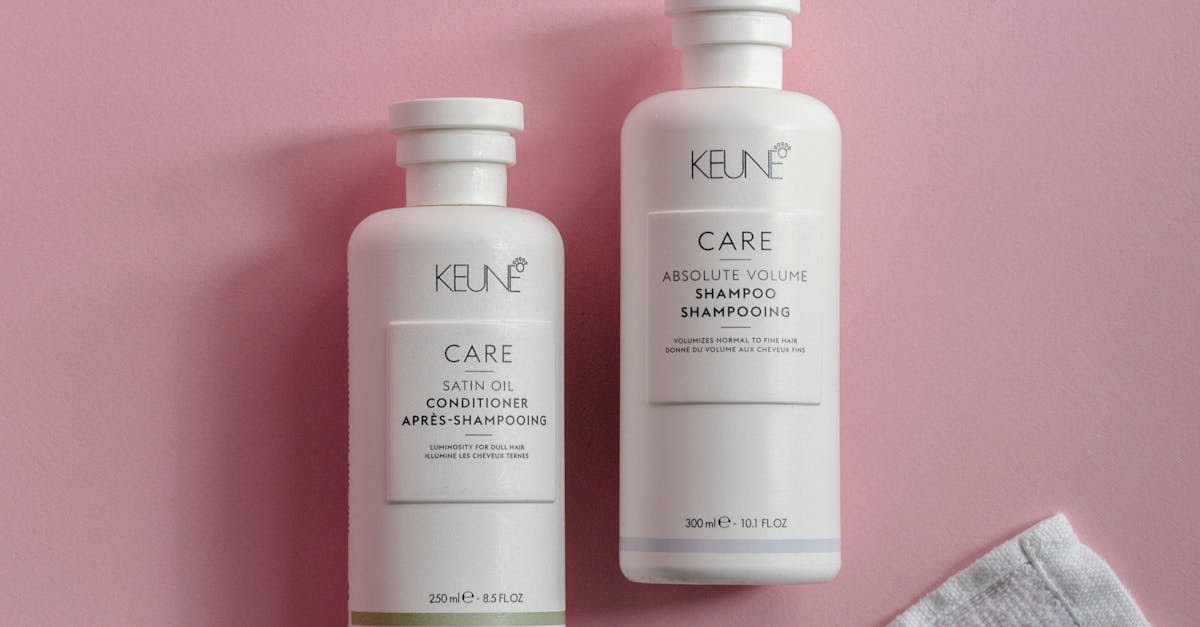 Shampoo and Conditioner on Pink Surface