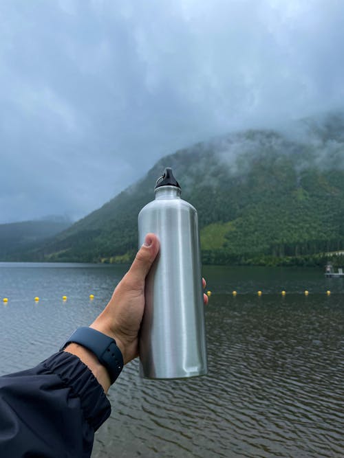 Gratis stockfoto met bewolkte lucht, buiten, fles