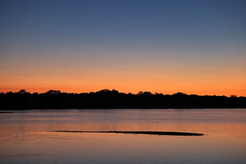 Calm Lake during Daybreak
