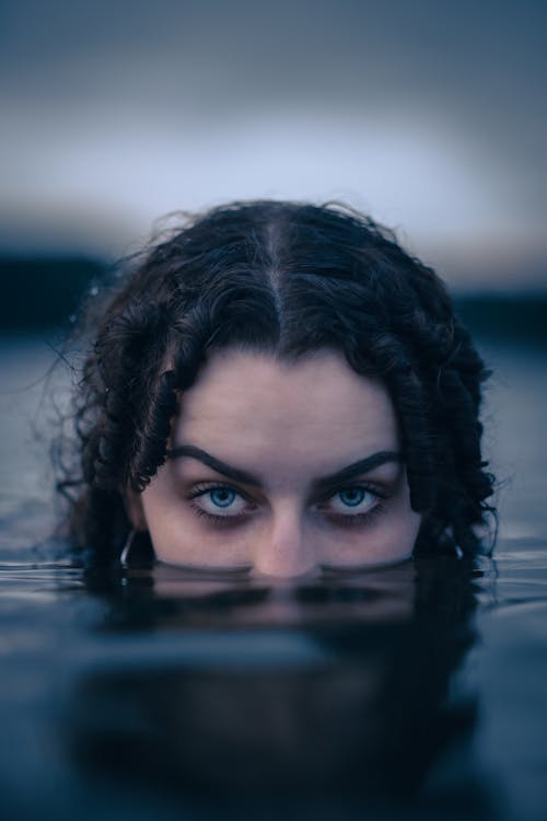 Close-up of Woman Emerging from Water 