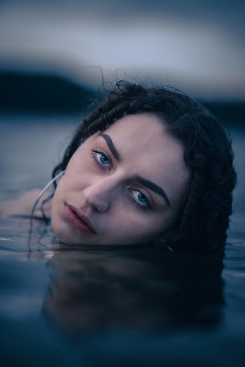 Close-up of Woman Emerging from Water 