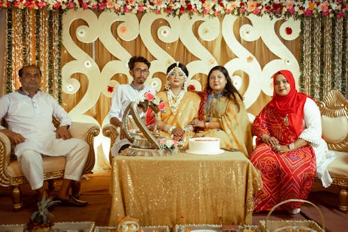 Bride and Groom with Parents on a Traditional Wedding 