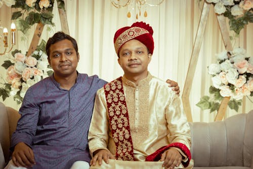 Portrait of Two Men Sitting