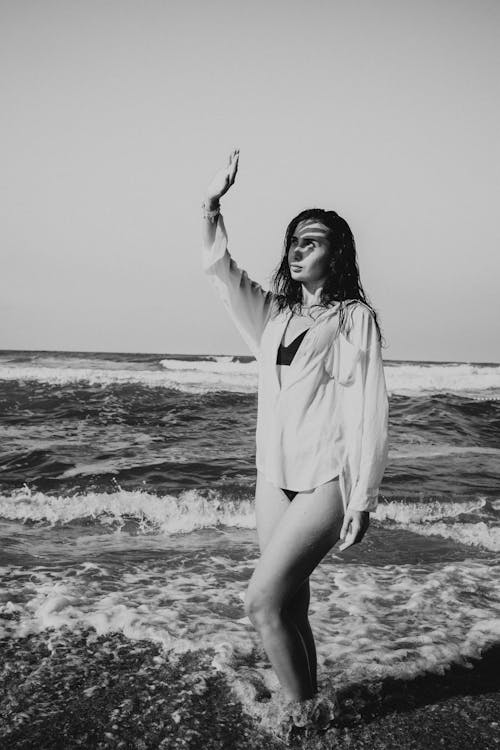 Grayscale Photo of Woman at the Beach