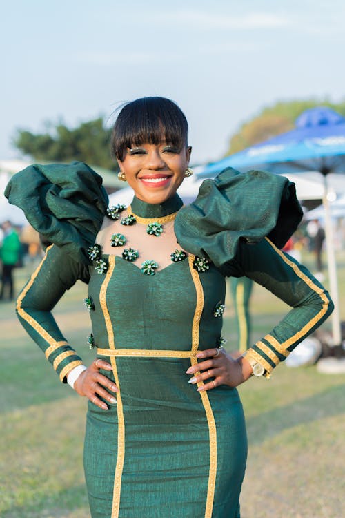 A Portrait of a Woman Wearing a Green Dress