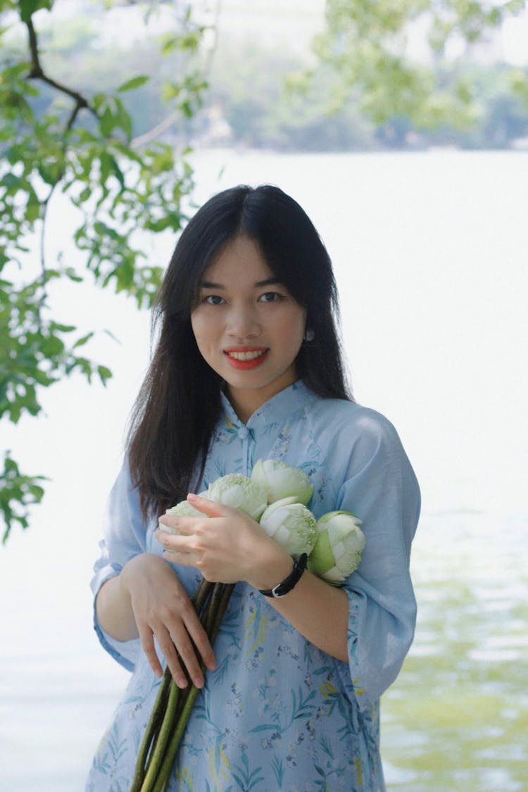 Portrait Of Woman With Flowers