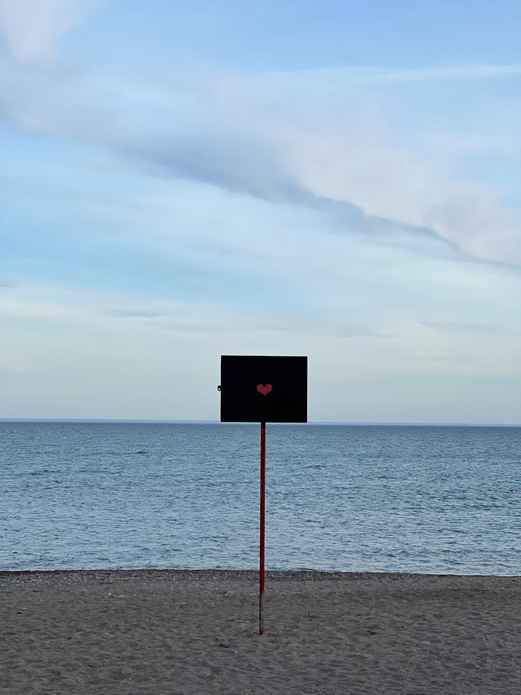 A Sign With A Heart On A Beach