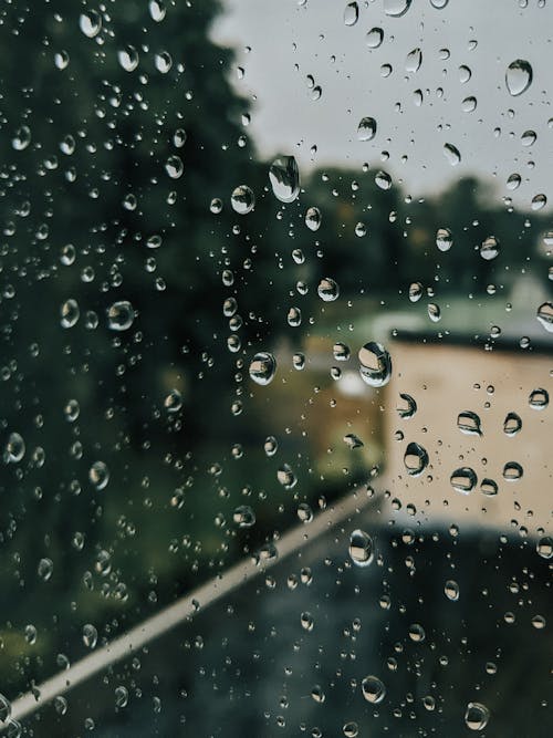 Free Water Droplets on a Glass Surface Stock Photo