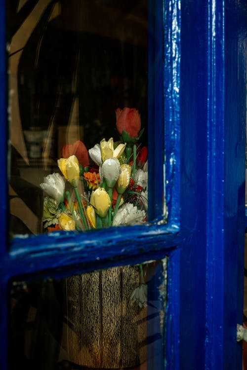 Free Flowers behind a Glass Window Stock Photo